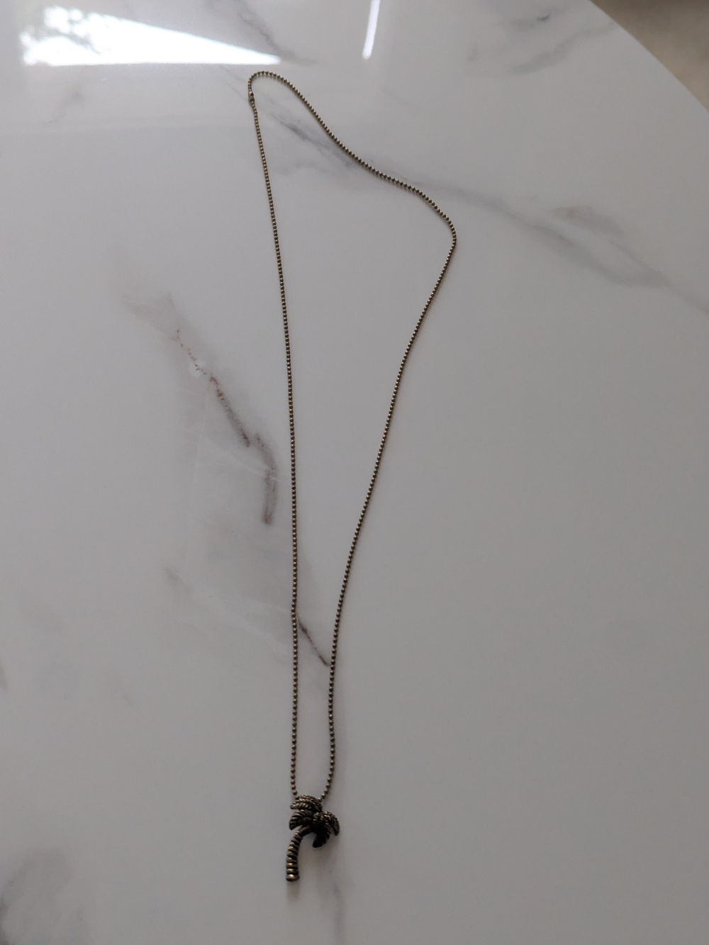 Delicate Palm Tree Pendant Necklace in Antiqued Gold